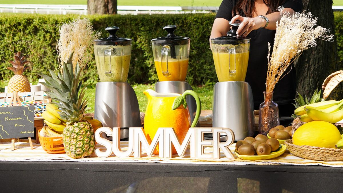 Chef preparing fresh smoothies at Taste Corner’s live station during an event in South Florida
