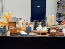 Coffee station with toppings, syrups, and styled buffet setup at Taste Corner’s catered event in South Florida