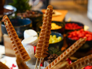 Waffles station setup at Taste Corner’s scenographic activation during a professional trade show in South Florida