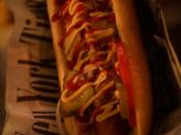 Gourmet hotdog ready to be enjoyed at Taste Corner’s scenographic station during a catered event in South Florida
