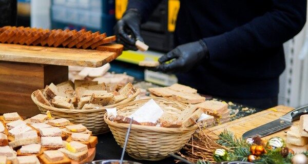 Chef preparing foie gras live station at Taste Corner event catering in South Florida