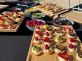 Taste Corner tartlet station with assorted sweet mini tarts for event catering in South Florida
