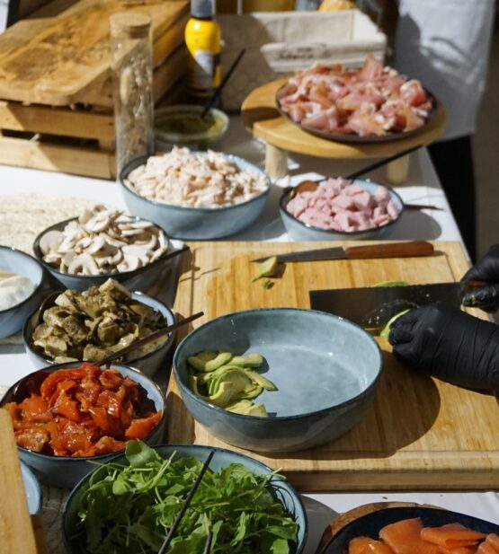 Chef preparing savory crepes at Taste Corner’s live station during an event