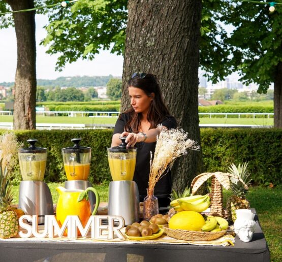 Chef preparing fresh smoothies at Taste Corner’s live station during an event in South Florida