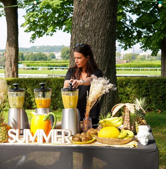 Chef preparing fresh smoothies at Taste Corner’s live station during an event in South Florida
